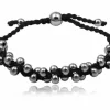 Knyttet armbånd med stålkugler