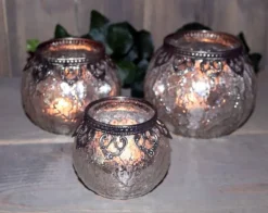 Runde orientalske bordlysestager i fattigmandssølv / SÆT