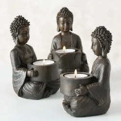 Små Buddha fyrfadslysestager i brun antik / 3stk